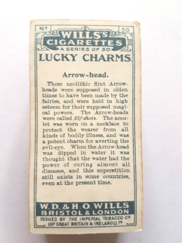 Photo of the back of these Lucky Charms cigarette cards