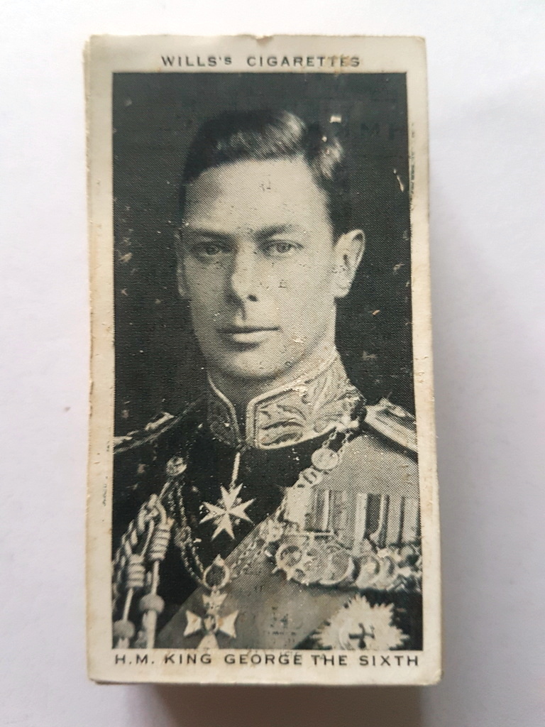 Photo of the front of these Our King and Queen cigarette cards