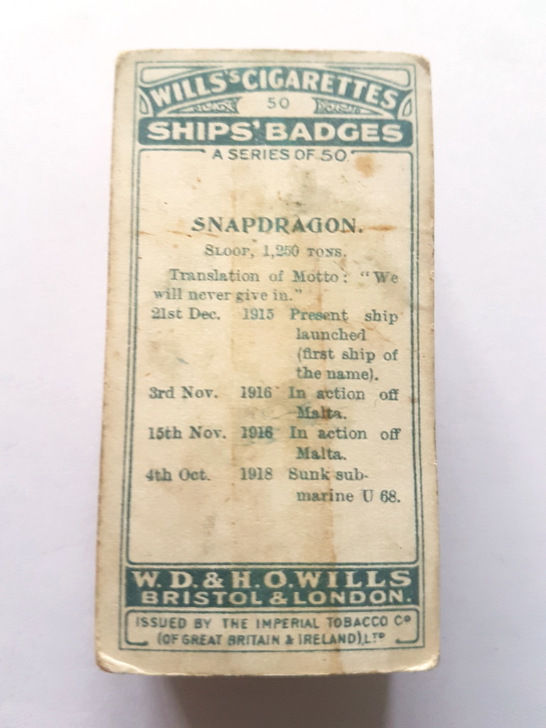 Photo of the back of these Ships' Badges cigarette cards