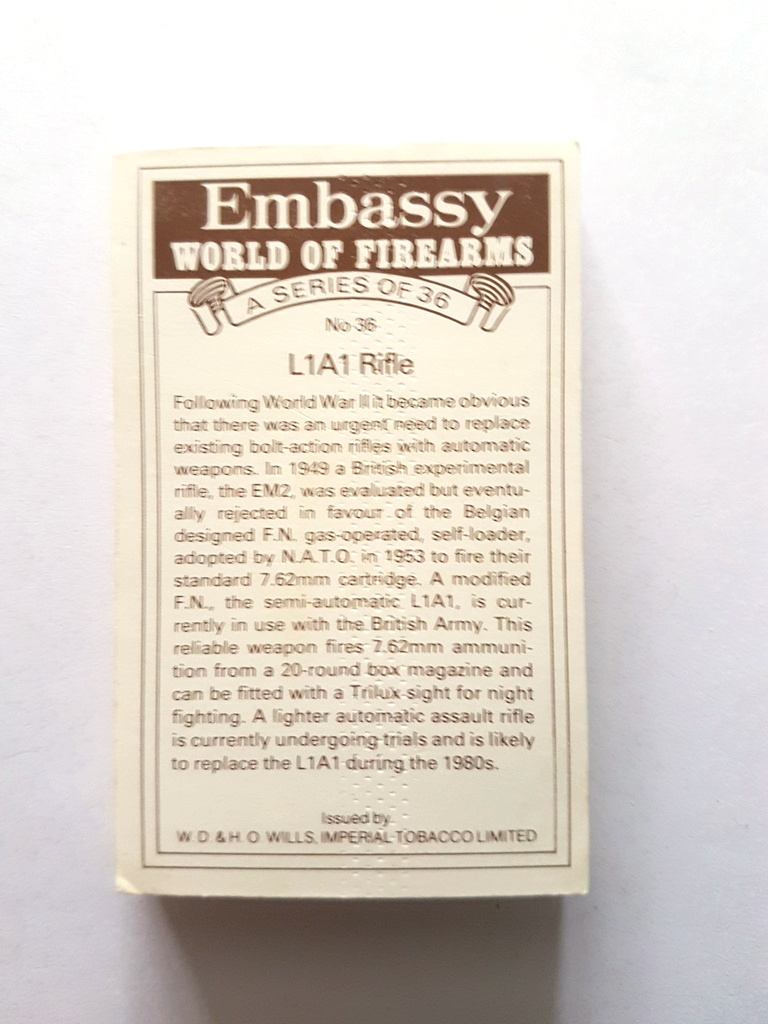 Photo of the back of these World of Firearms cigarette cards