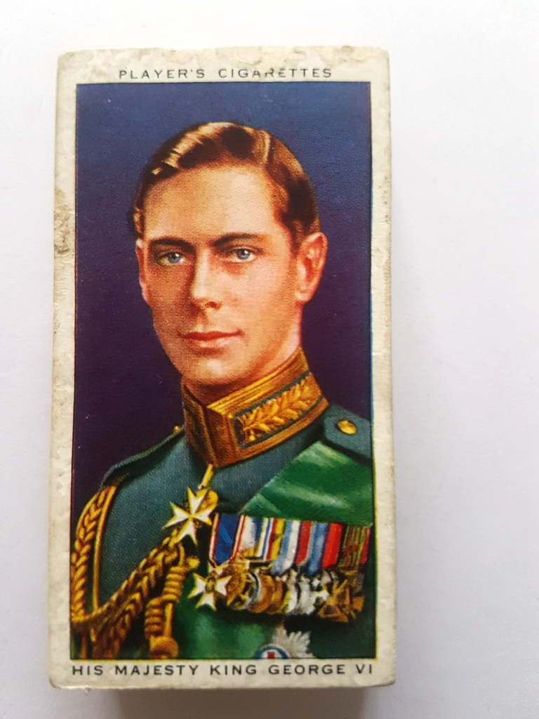 Photo of the front of these Coronation Series Ceremonial Dress cigarette cards