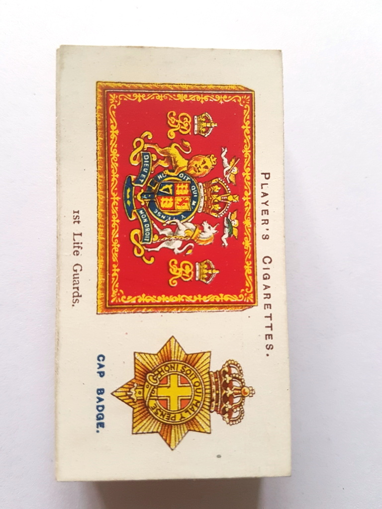 Photo of the front of these Drum Banners & Cap Badges cigarette cards