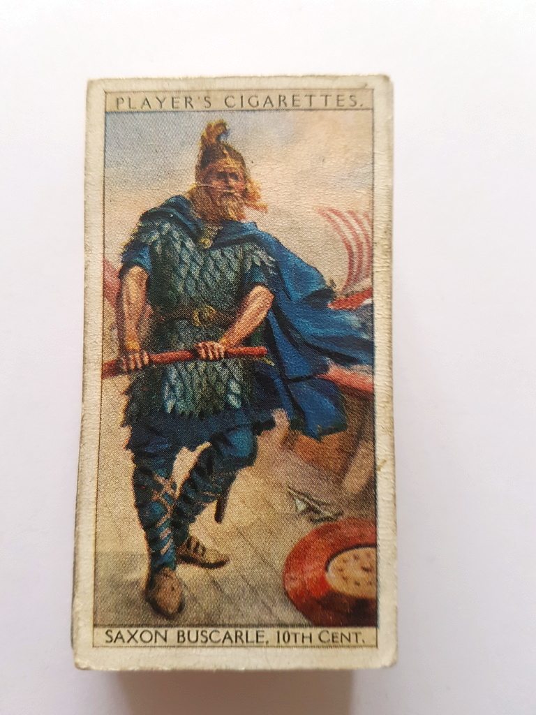 Photo of the front of these History of Naval Dress cigarette cards