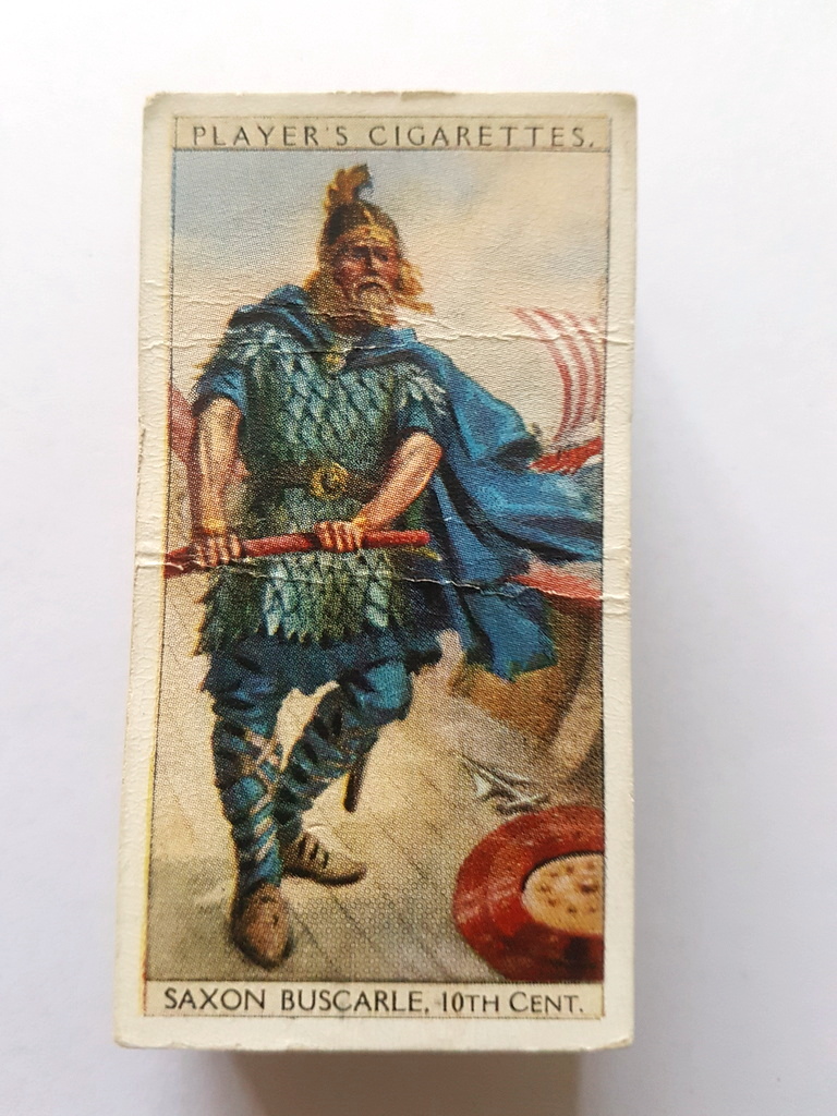 Photo of the front of these History of Naval Dress cigarette cards