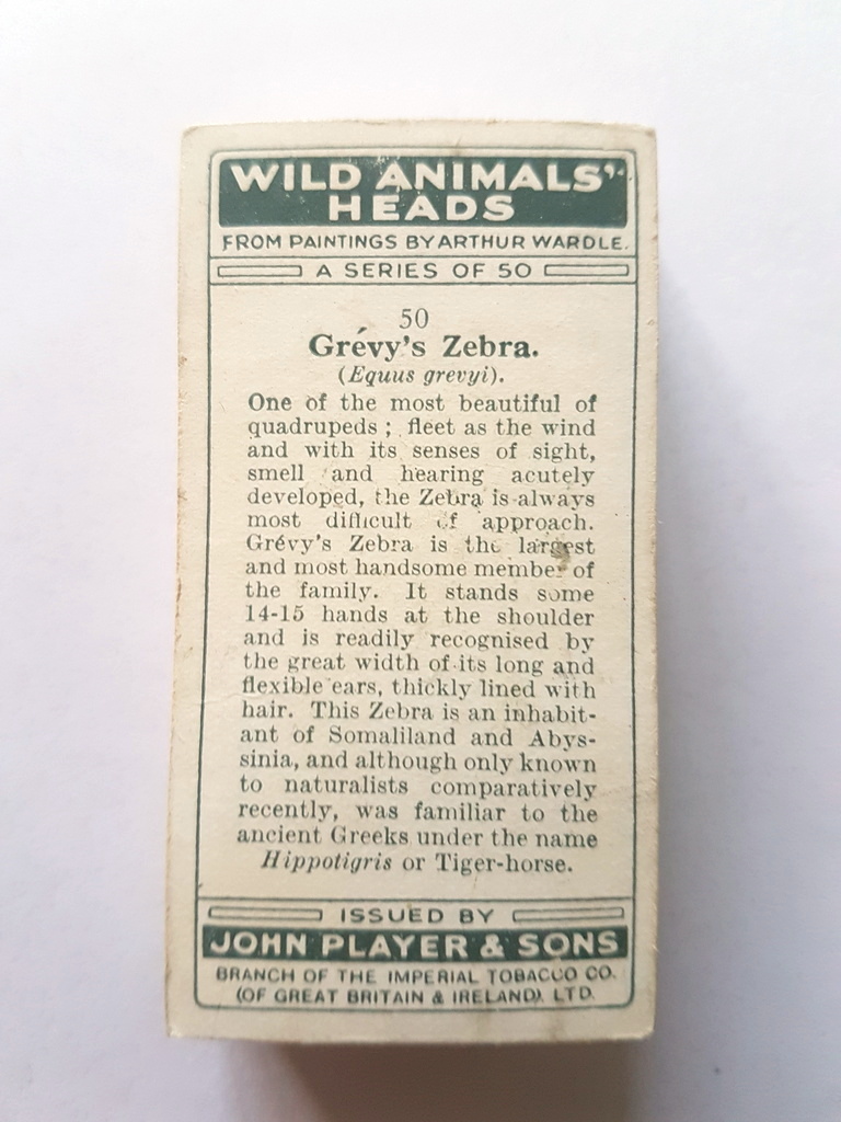 Photo of the back of these Wild Animals' Heads cigarette cards