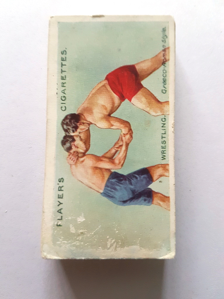 Photo of the front of these Wrestling & Ju-Jitsu (blue back) cigarette cards