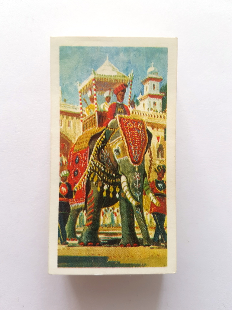 Photo of the front of these Transport Through the Ages tea cards