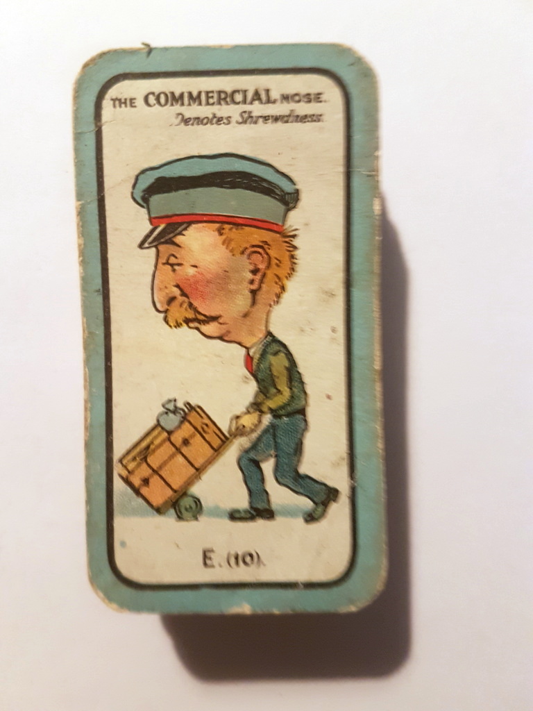 Photo of the front of these The Nose Game cigarette cards