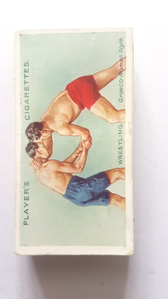 Photo of the front of these Wrestling & Ju-Jitsu (blue back) cigarette cards