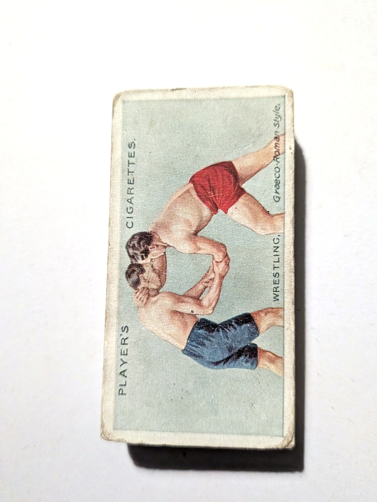 Photo of the front of these Wrestling & Ju-Jitsu (blue back) cigarette cards